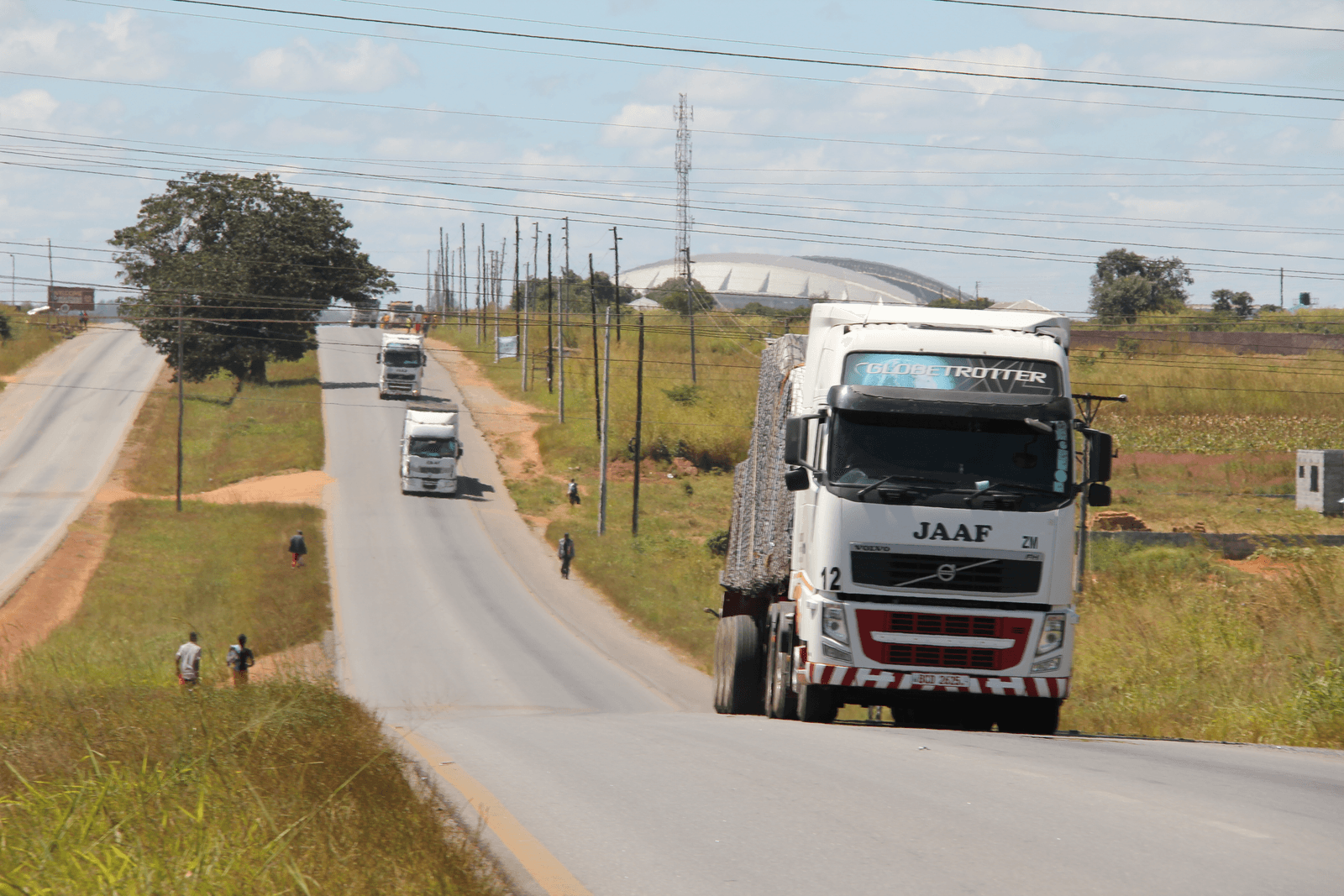 JAAF trucks moving in convoy on the road from Ndola