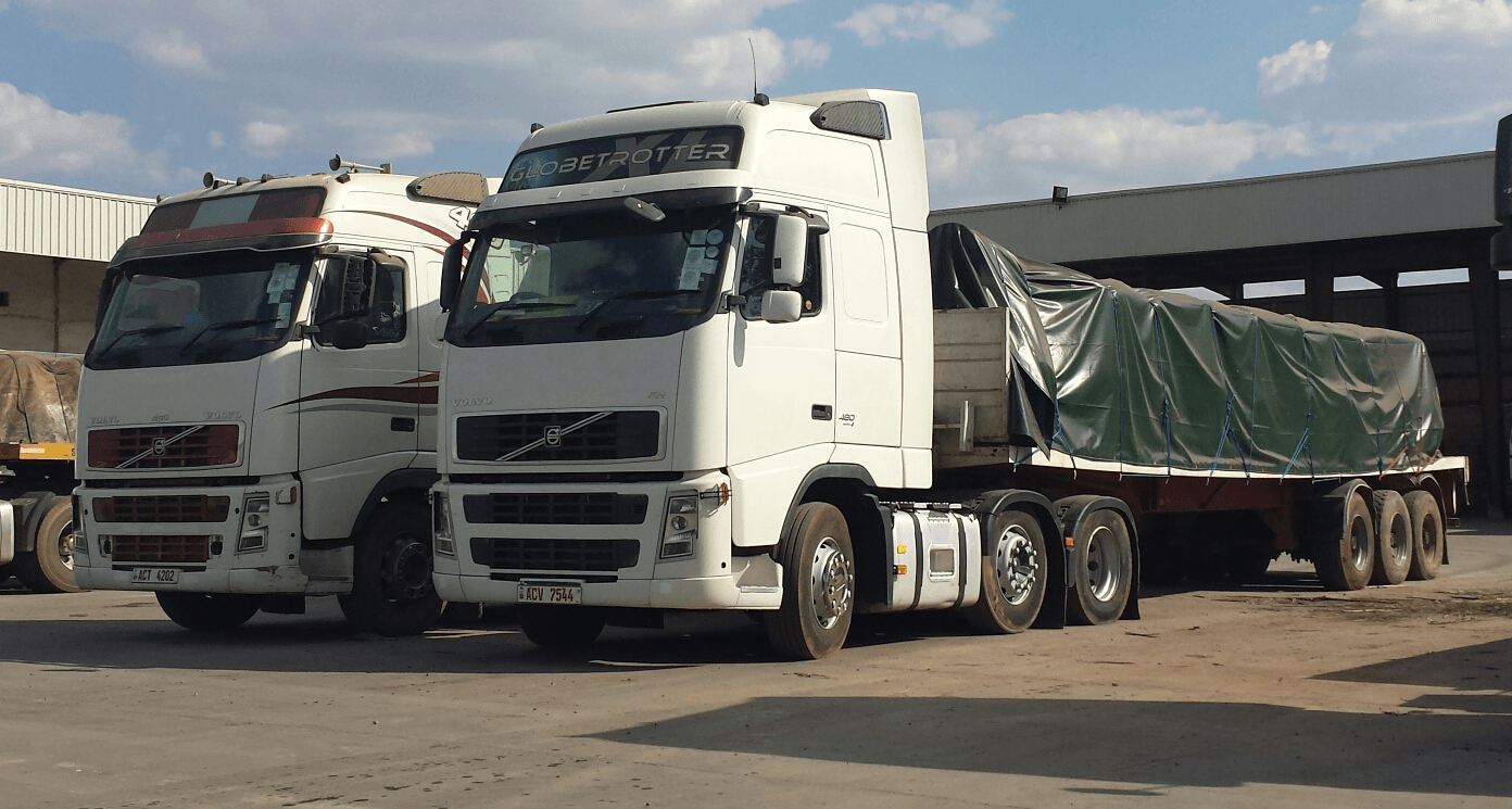 JAAF fleet trucks staged with a covered load